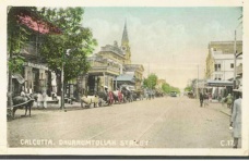 Westward view of Dhurrumtollah Street. n,d. (picture Postcard) Courtesy: Ebay